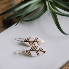 hanging leaf earrings with gold accent, white and gold earrings, Austin jewelry, social impact jewelry, ethical accessory