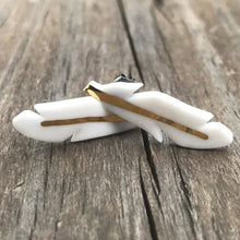 feather stud earrings with gold accent, gold filigree jewelry, white and gold, Austin jewelry, porcelain wearable art, social impact jewelry, ethical accessory