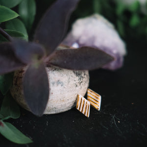 textured golden rhombus porcelain earrings, gold filigree jewelry, white and gold, Austin jewelry, porcelain wearable art, social impact jewelry, ethical accessory