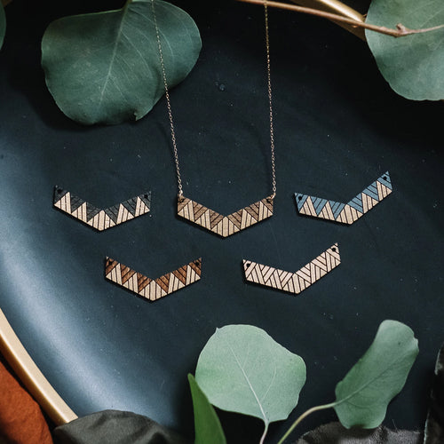 wooden chevron geometric pattern necklace, Austin jewelry, artisan wood wearable art, social impact jewelry, ethical accessory, stained wood jewelry