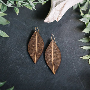 wood leaf earrings with lined arches, gilded wood earrings, Austin jewelry, artisan wood wearable art, social impact jewelry, ethical accessory