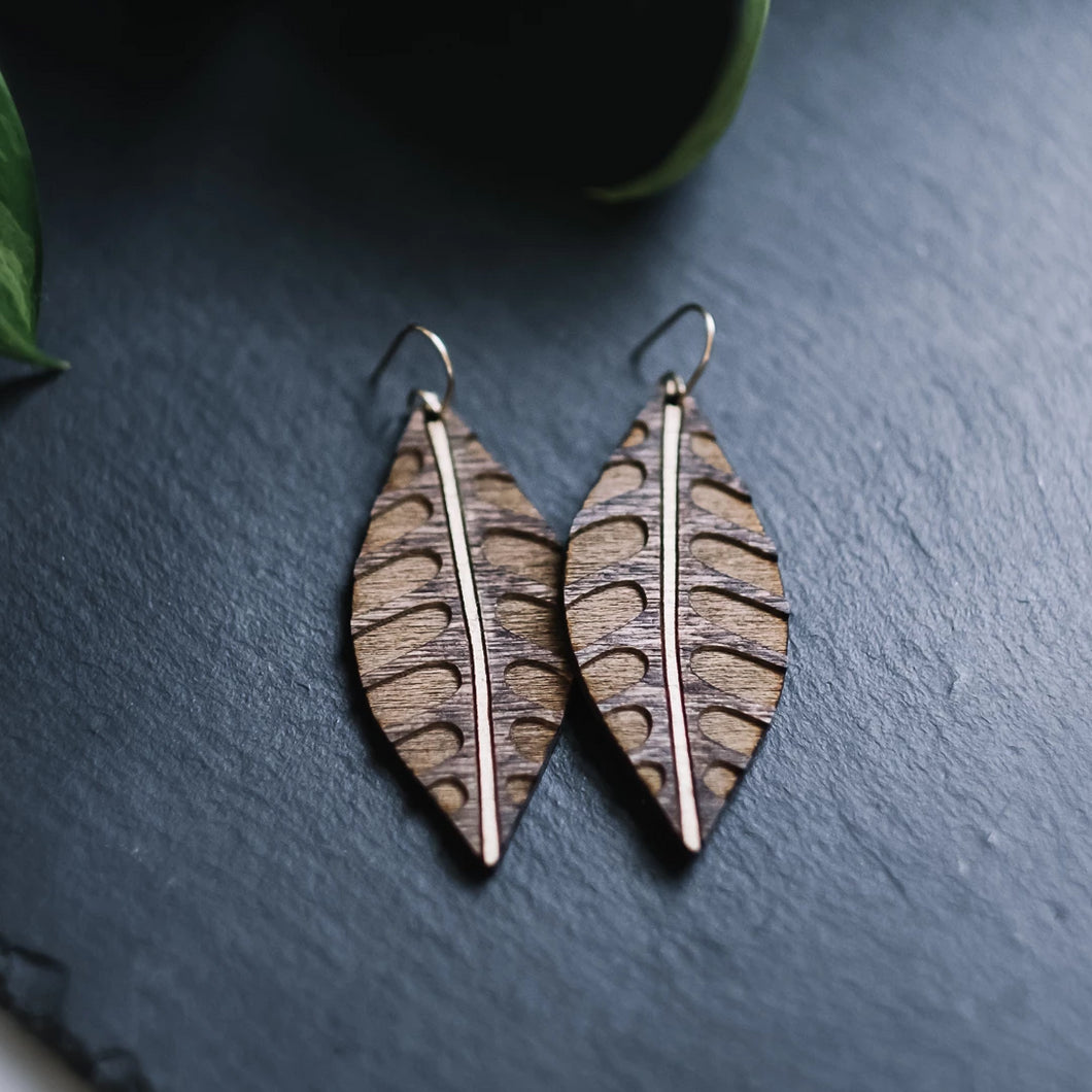wood leaf earrings with etched arches, gilded wood earrings, Austin jewelry, artisan wood wearable art, social impact jewelry, ethical accessory