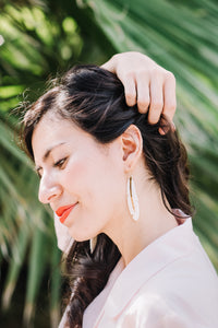 large feather white porcelain earrings with gold accent, gold filigree jewelry, white and gold, Austin jewelry, porcelain wearable art, social impact jewelry, ethical accessory