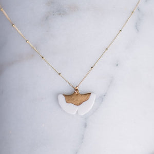 porcelain ginkgo necklace with gold accent, gold filigree jewelry, white and gold, Austin jewelry, porcelain wearable art, social impact jewelry, ethical accessory