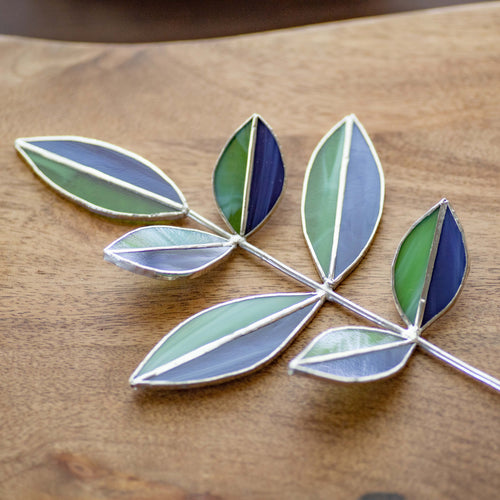 green and blue stained glass leaves