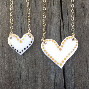 Dot bordered porcelain heart necklace, gold filigree jewelry, white and gold, Austin jewelry, porcelain wearable art, social impact jewelry, ethical accessory