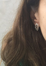 small white porcelain leaf studs with gold or white-gold design, Austin jewelry, social impact jewelry, ethical accessory