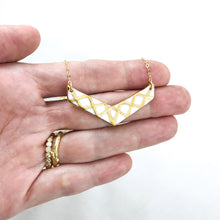 golden chevron necklace, gold filigree jewelry, white and gold, gold studs, Austin jewelry, porcelain wearable art, social impact jewelry, ethical accessory