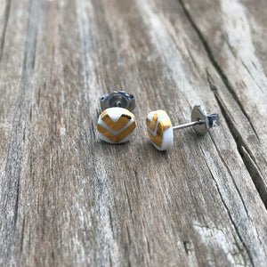 tiny dot studs with gold chevron accent, gold filigree jewelry, white and gold, Austin jewelry, porcelain wearable art, social impact jewelry, ethical accessory