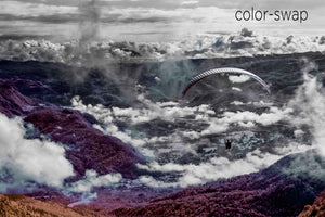 parasail aerial photo, cloud and mountain landscape, infrared photography, drone photography, Austin photographer