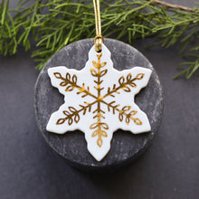 white and gold snowflake ornament